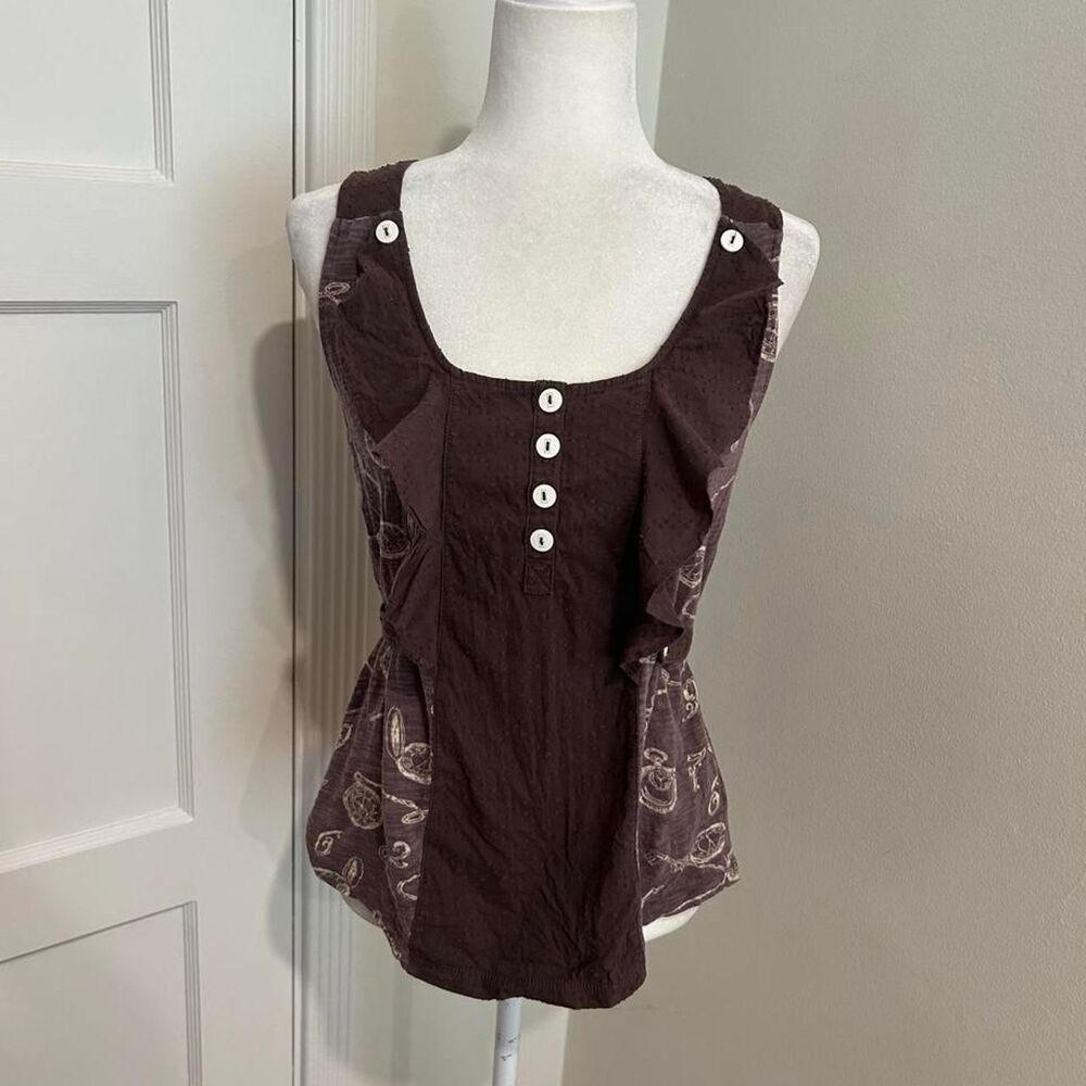 Ruffle blouse with white clock graphic print and button henley detail M